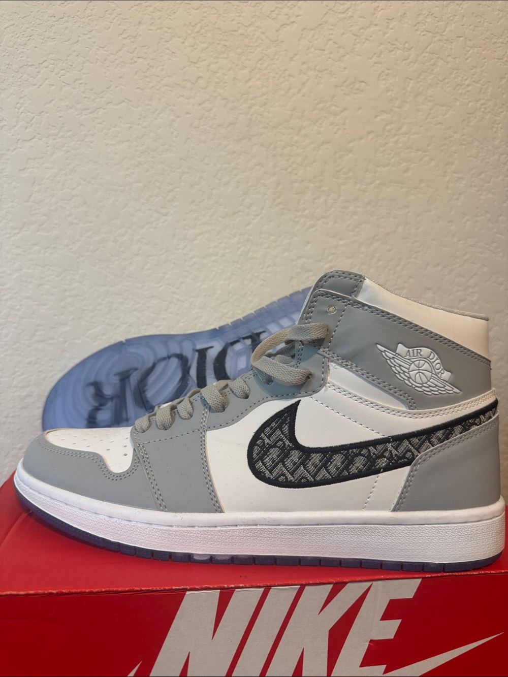 Nike Air Jordan 1 Mid in White & Light Gray with Black Patterned Swoosh